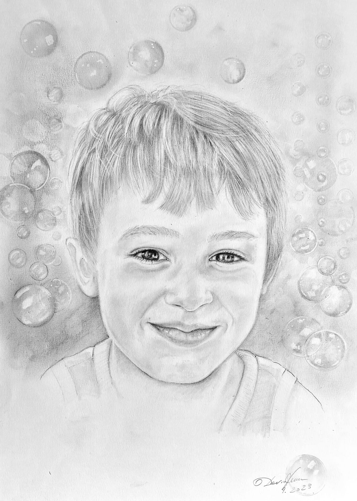 Ritratto bambino con bolle di sapone